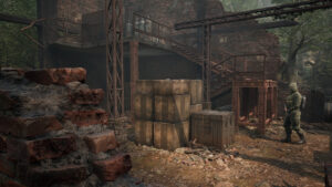 Snake accroupi au sol recouvert de boue avec couteau et silencieux