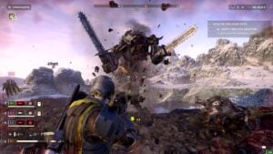 Helldivers 2 combat contre un boss mécanique équipé de tronçonneuses