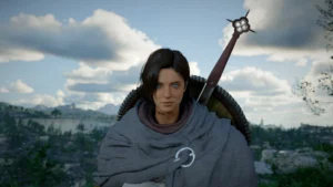 Mod Character Creator Female Crimson Desert PC - préset visage féminin aux yeux bleus électriques et tresses noires avec cape grise, vue frontale